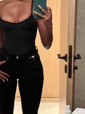 Skims black seamless sculpt thong bodysuit